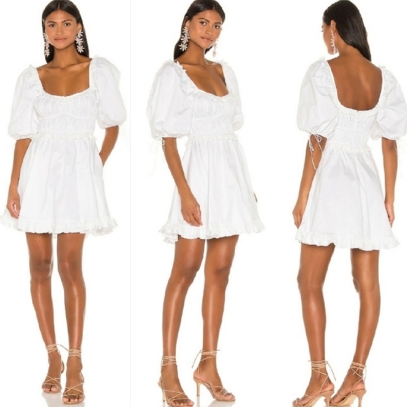 embellished a-line mini dress in silver Playful Charm Sheer Chiffon Embellished Feather Back Bow H-line Mini –  prettylilygal